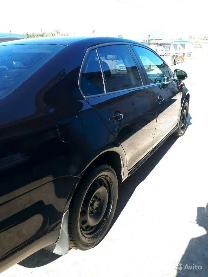 Фото автомобиля VOLKSWAGEN JETTA, 2009 — госномер О038ХР12. Цвет: ЧЕРНЫЙ