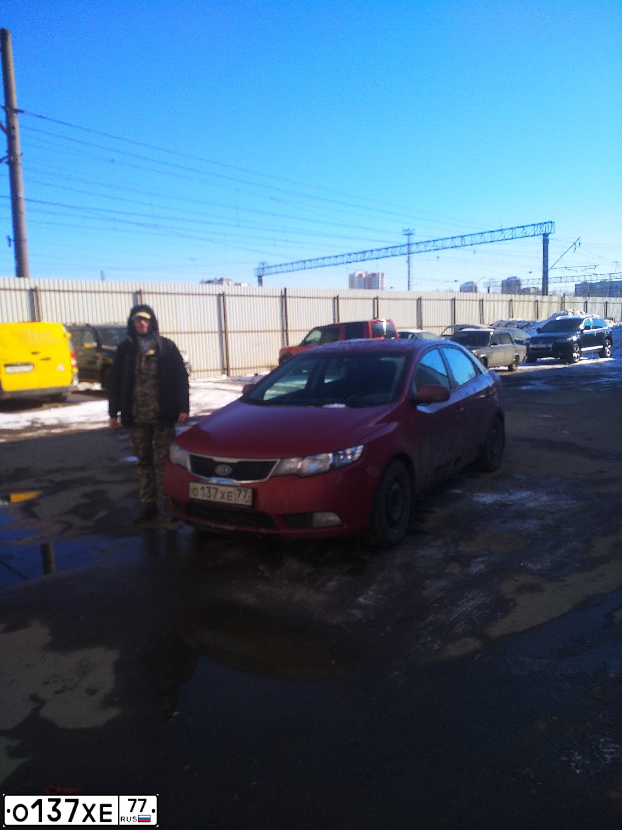 Фото автомобиля KIA CERATO, 2011 — госномер О372РС797. Цвет: Красный