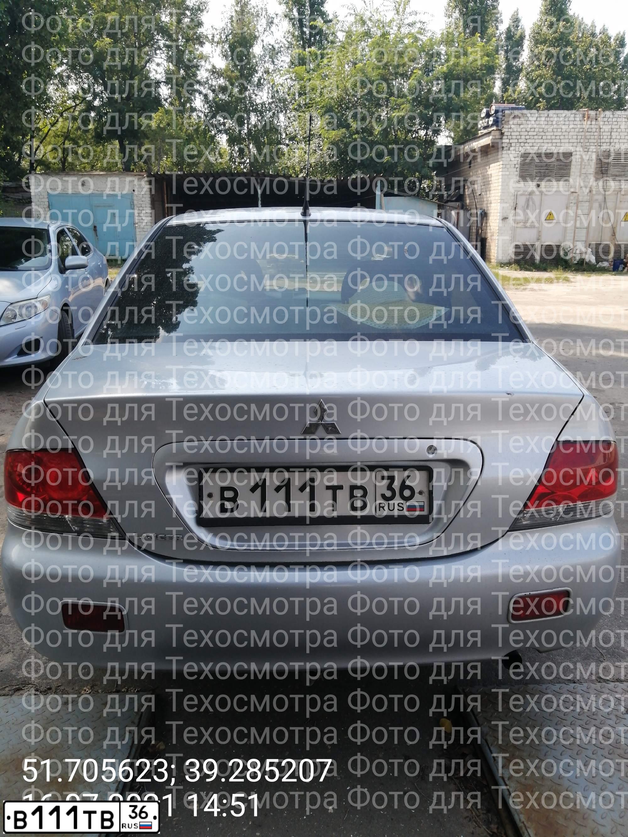 Фото автомобиля MITSUBISHI LANCER, 2005 — госномер В111ТВ36. Цвет: серебристый