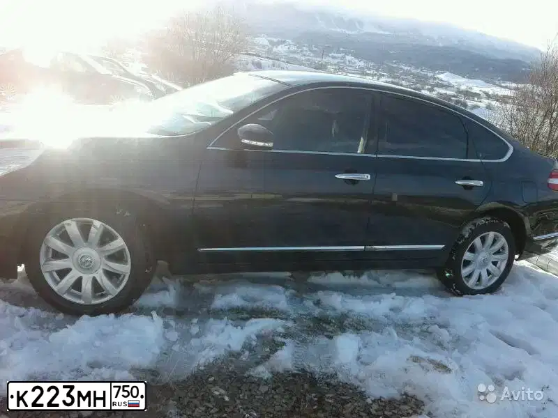 Фото автомобиля NISSAN TEANA, 2010 — госномер К583КК190. Цвет: ЧЕРНЫЙ