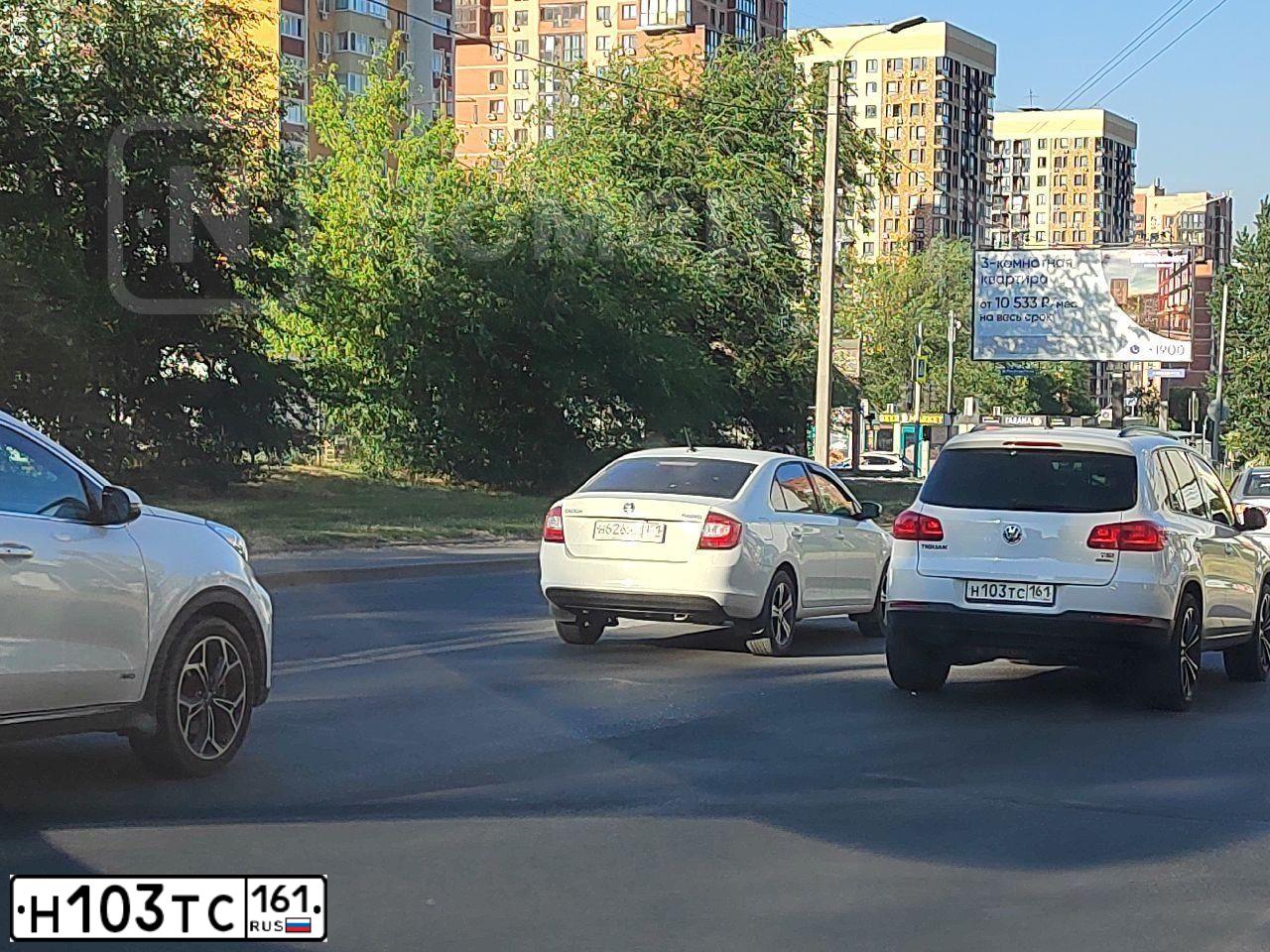 Фото автомобиля VOLKSWAGEN TIGUAN, 2012 — госномер Н103ТС161. Цвет: БЕЛЫЙ