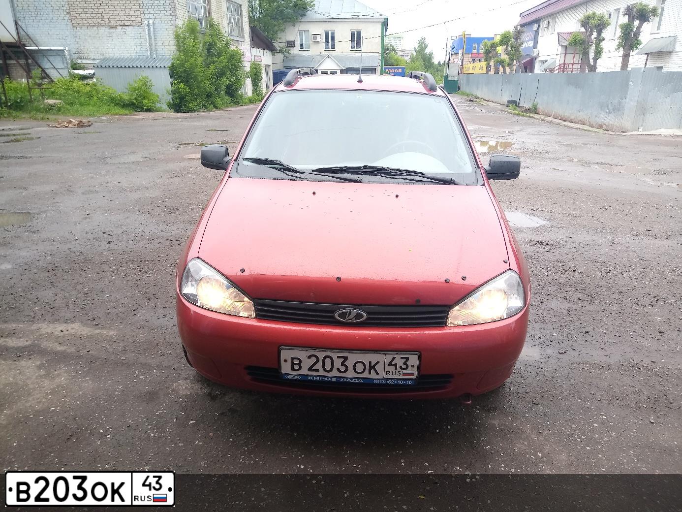Фото автомобиля LADA 1117 KALINA, 2012 — госномер В203ОК43. Цвет: СЕРЕБРИСТО-КРАСНЫЙ