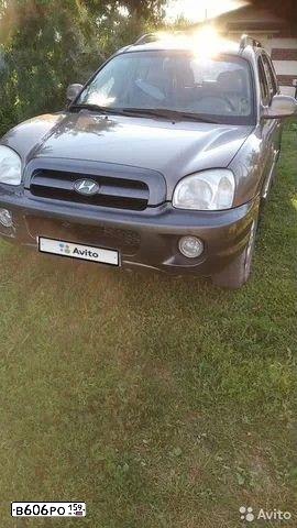 Фото автомобиля HYUNDAI SANTA FE, 2005 — госномер К307ВВ702. Цвет: ТЕМНО-БЕЖЕВЫЙ