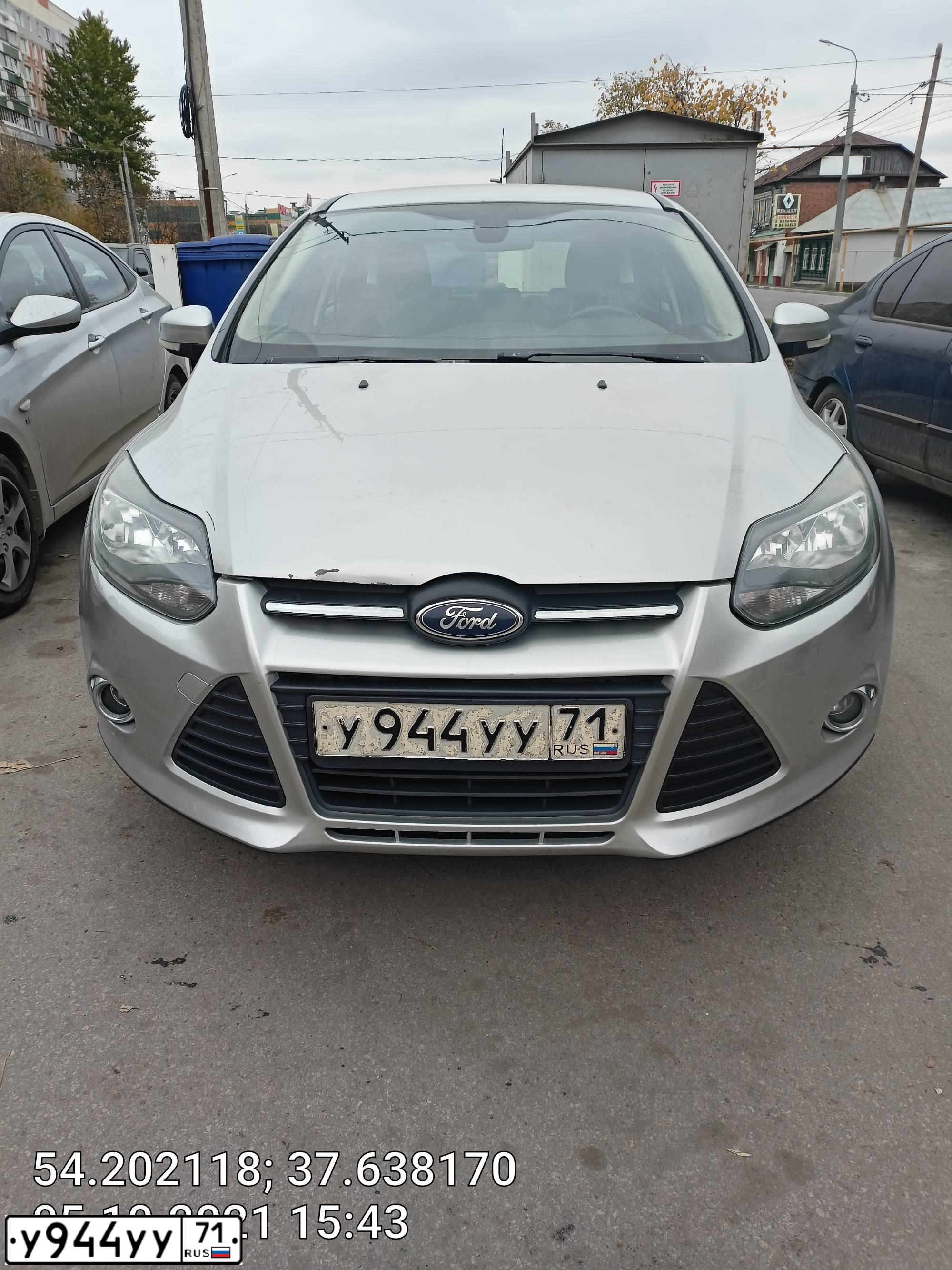 Фото автомобиля FORD FOCUS, 2011 — госномер У944УУ71. Цвет: Серебристый