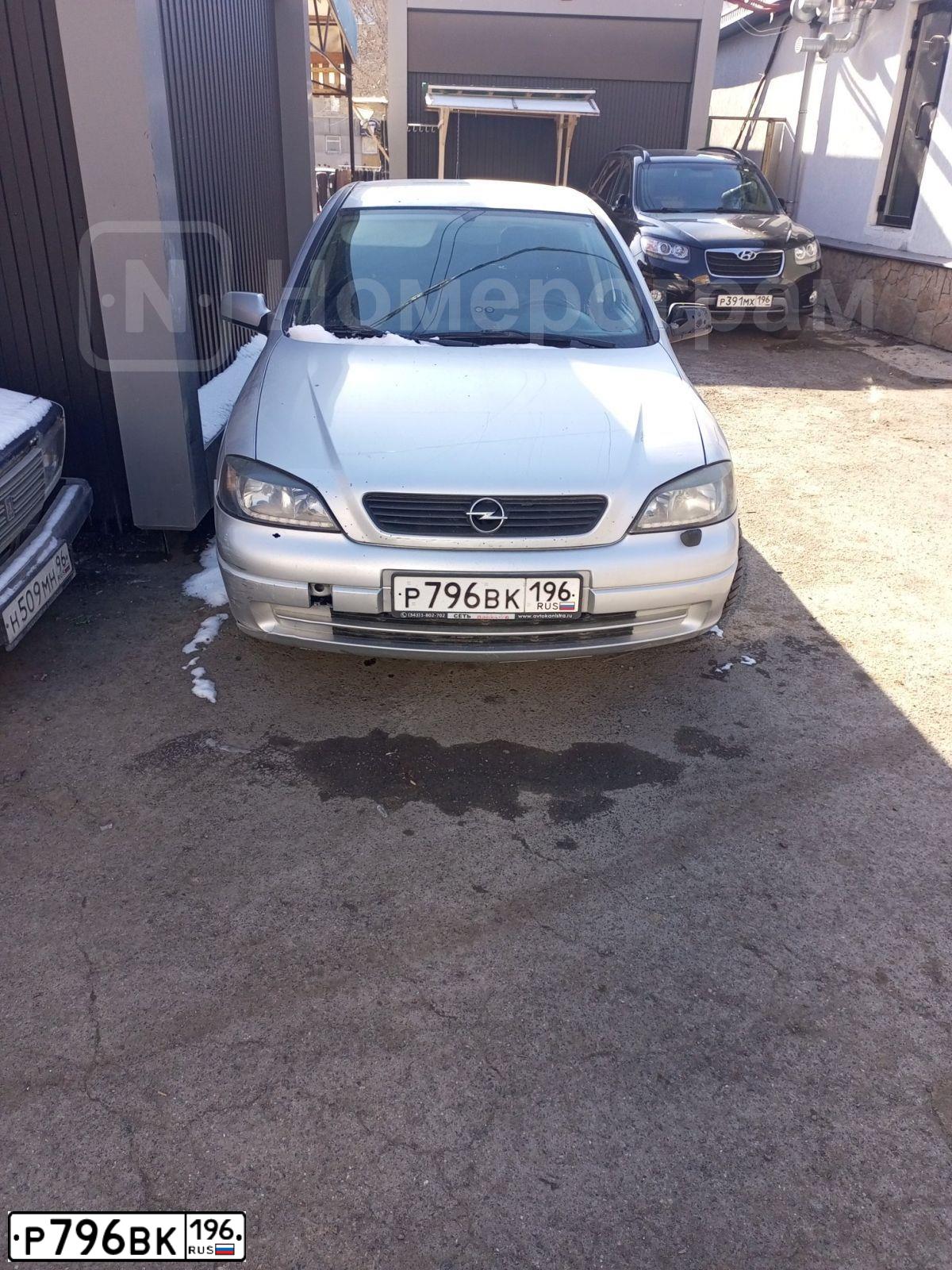 Фото автомобиля OPEL ASTRA, 2001 — госномер Х661УС72. Цвет: СВЕТЛО-СЕРЫЙ