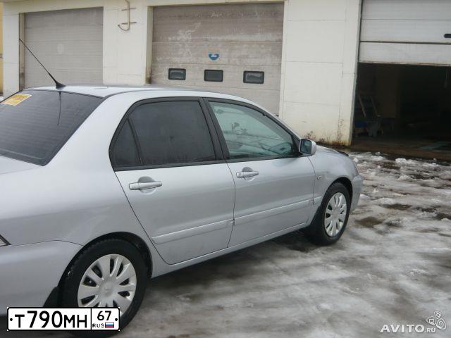 Фото автомобиля MITSUBISHI LANCER, 2006 — госномер О497УТ32. Цвет: СЕРЕБРИСТЫЙ