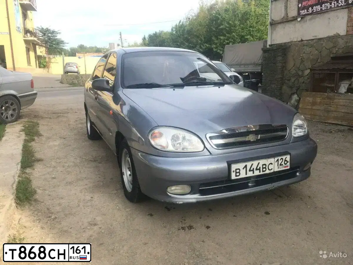 Фото автомобиля CHEVROLET AVEO, 2013 — госномер Т868СН161. Цвет: ЧЕРНЫЙ