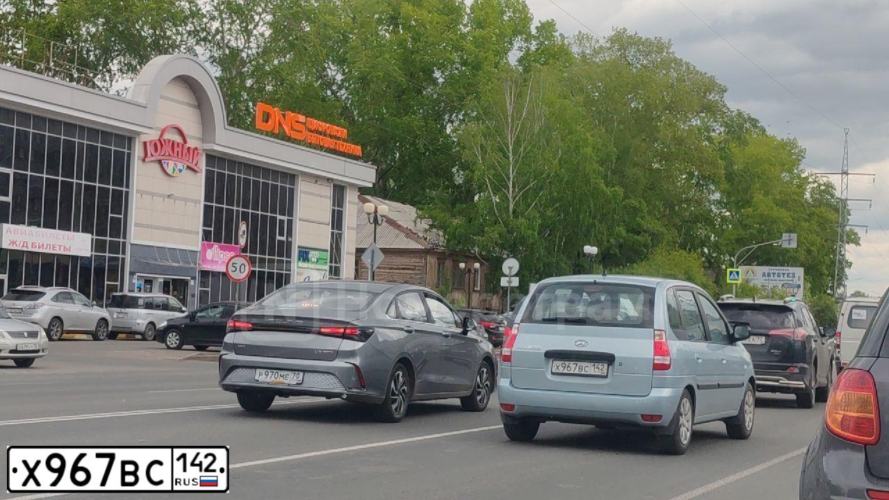 Фото автомобиля HYUNDAI MATRIX, 2009 — госномер Н843КЕ70. Цвет: СЕРО-ГОЛУБОЙ