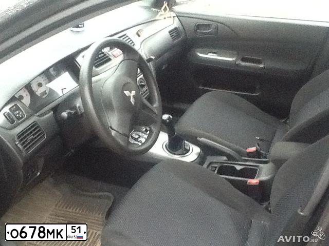 Фото автомобиля MITSUBISHI LANCER, 2006 — госномер О678МК51. Цвет: ЧЕРНЫЙ