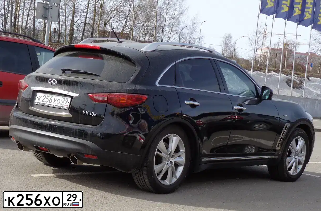 Фото автомобиля AUDI A4, 2009 — госномер Р352АА29. Цвет: Белый