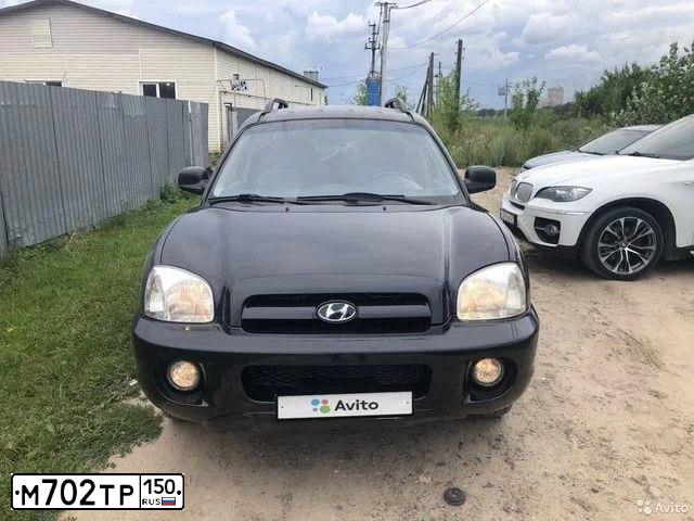 Фото автомобиля TAGAZ SANTA FE CLASSIC, 2008 — госномер Е271СН702. Цвет: ЧЕРНЫЙ