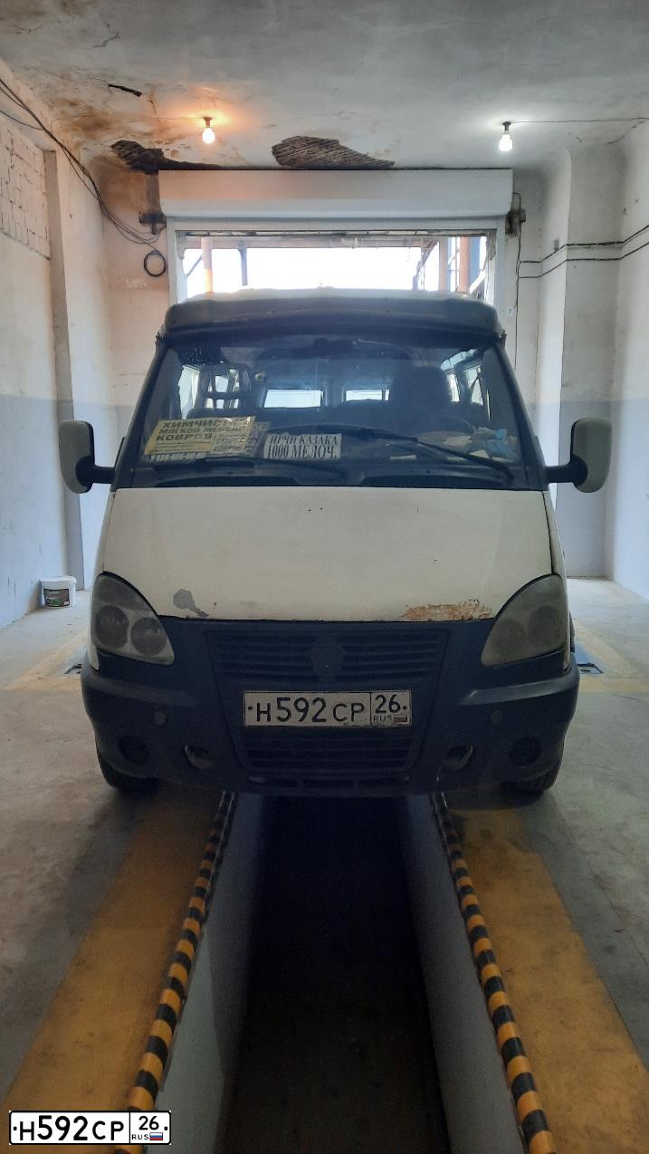 Фото автомобиля GAZ 3221 EL, 2004 — госномер Н592СР26. Цвет: Белый