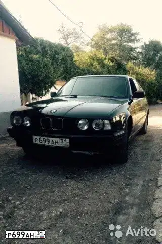 Фото автомобиля BMW SERIE 5, 1989 — госномер Р699АН31. Цвет: ЧЕРНЫЙ