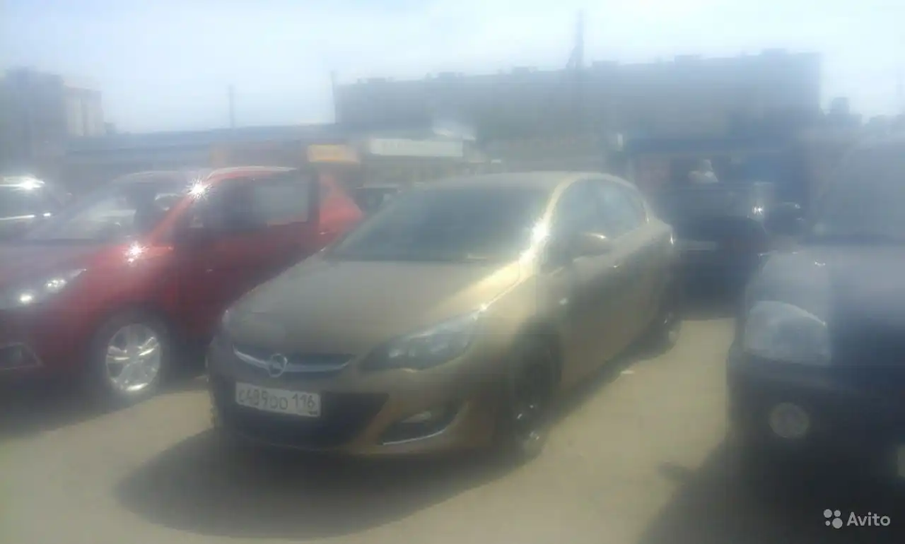 Фото автомобиля OPEL ASTRA, 2012 — госномер М077РМ21