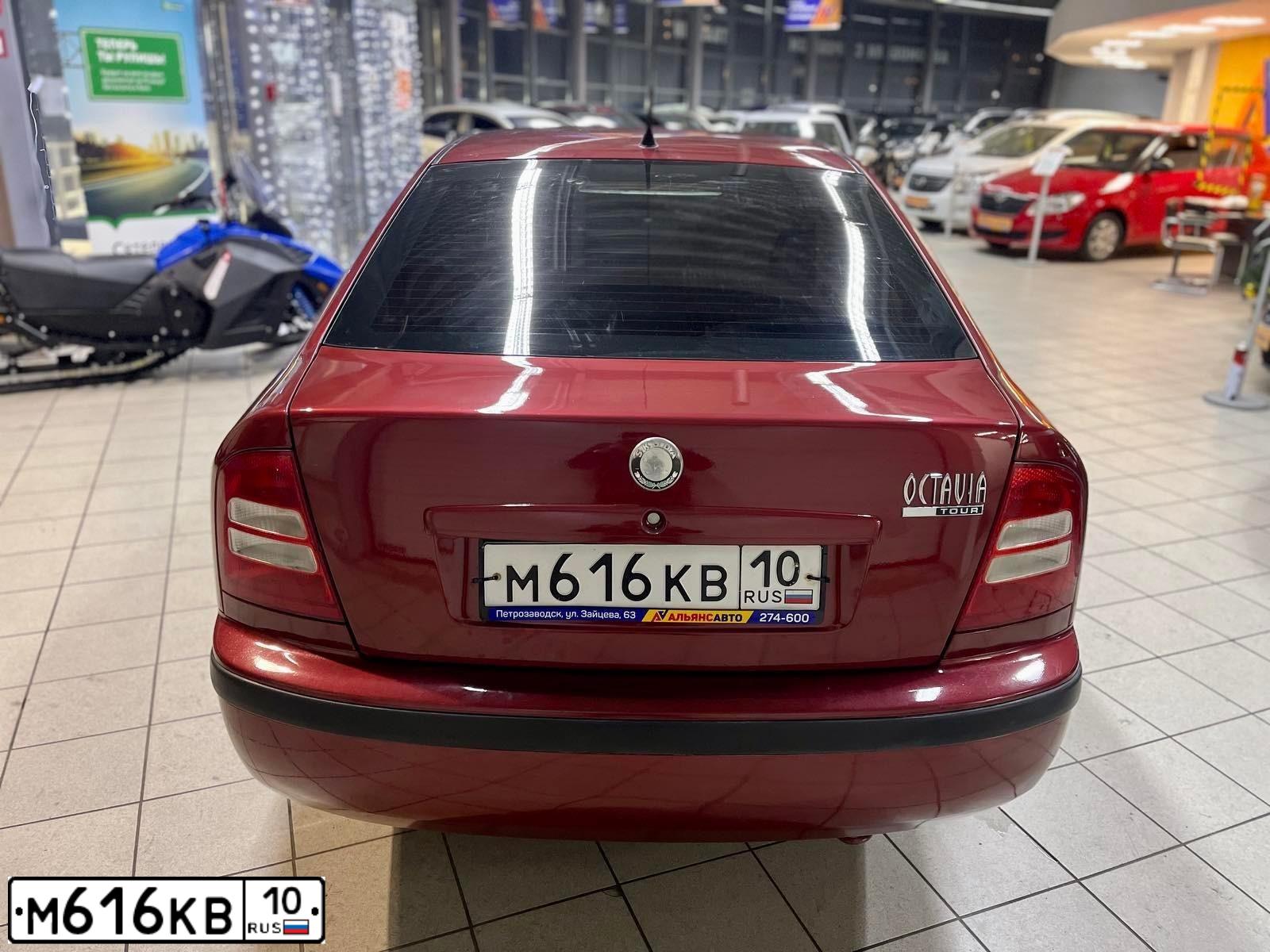 Фото автомобиля SKODA OCTAVIA, 2007 — госномер Т342АМ977. Цвет: ВИШНЕВЫЙ