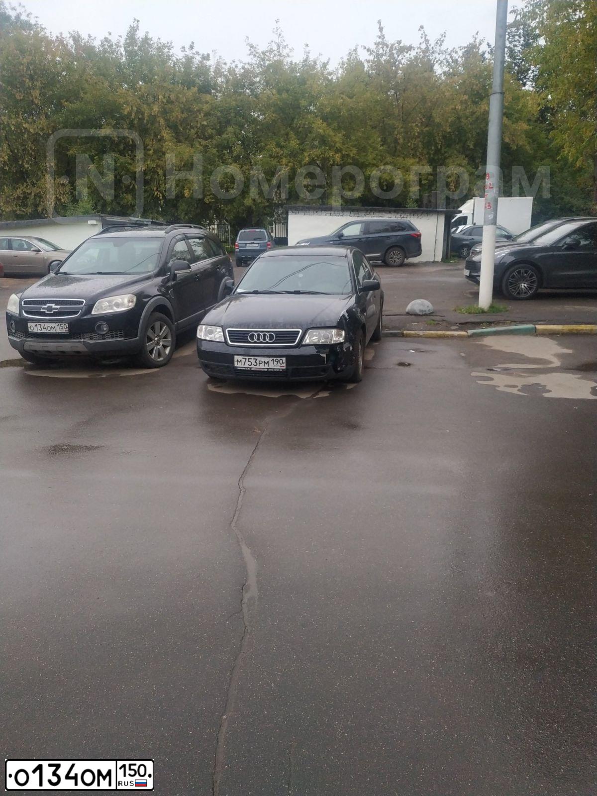 Фото автомобиля CHEVROLET CAPTIVA, 2007 — госномер О134ОМ150. Цвет: ЧЕРНЫЙ