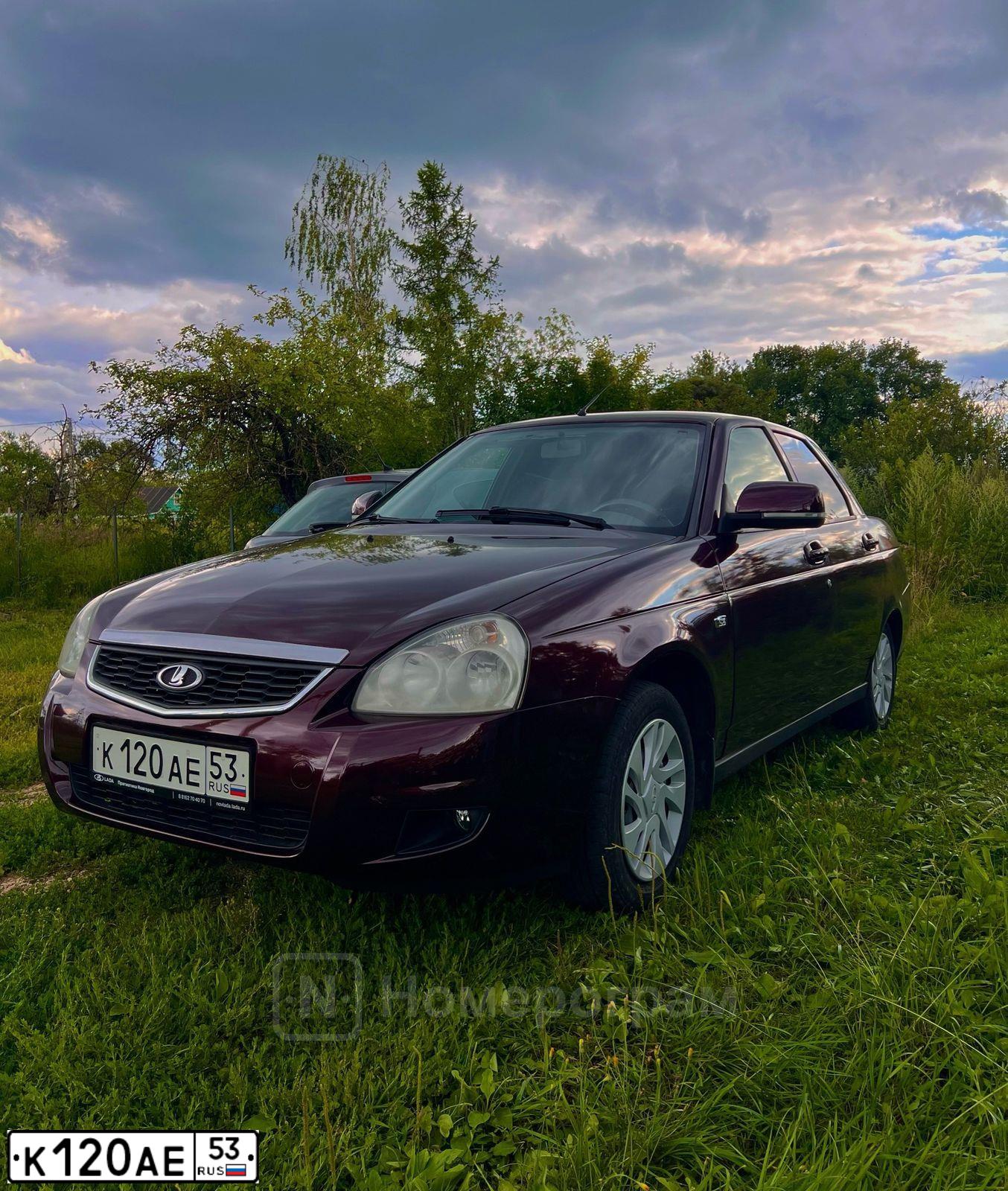 Фото автомобиля LADA 2170 PRIORA, 2011 — госномер К120АЕ53. Цвет: ТЕМНО-ВИШНЕВЫЙ