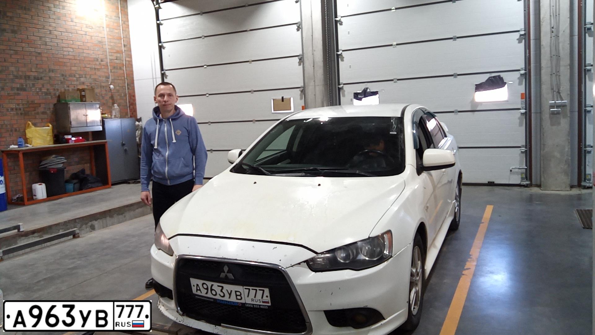 Фото автомобиля MITSUBISHI LANCER, 2014 — госномер Н877ТА161. Цвет: Белый