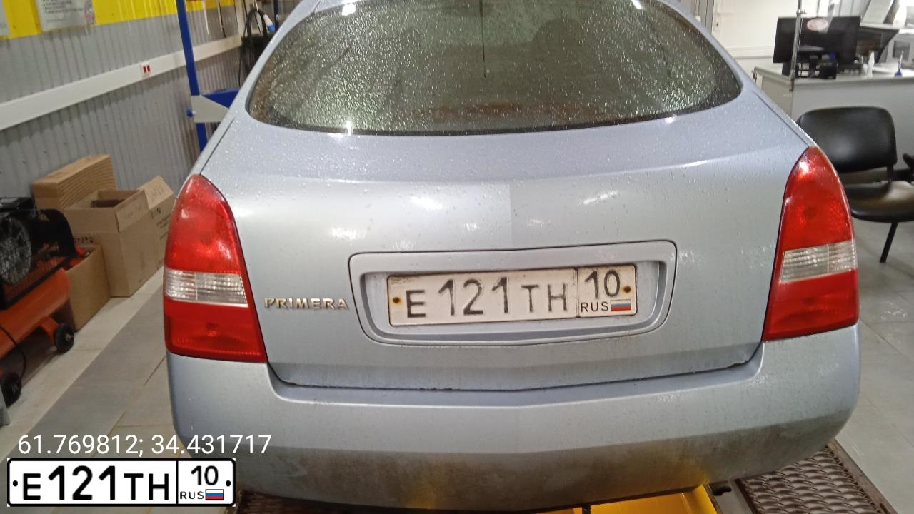 Фото автомобиля NISSAN PRIMERA, 2004 — госномер Е121ТН10. Цвет: ГОЛУБОЙ