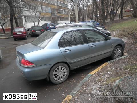 Фото автомобиля MITSUBISHI LANCER, 2005 — госномер К990РМ790. Цвет: СВЕТЛО-СЕРО-ЗЕЛЕНЫЙ