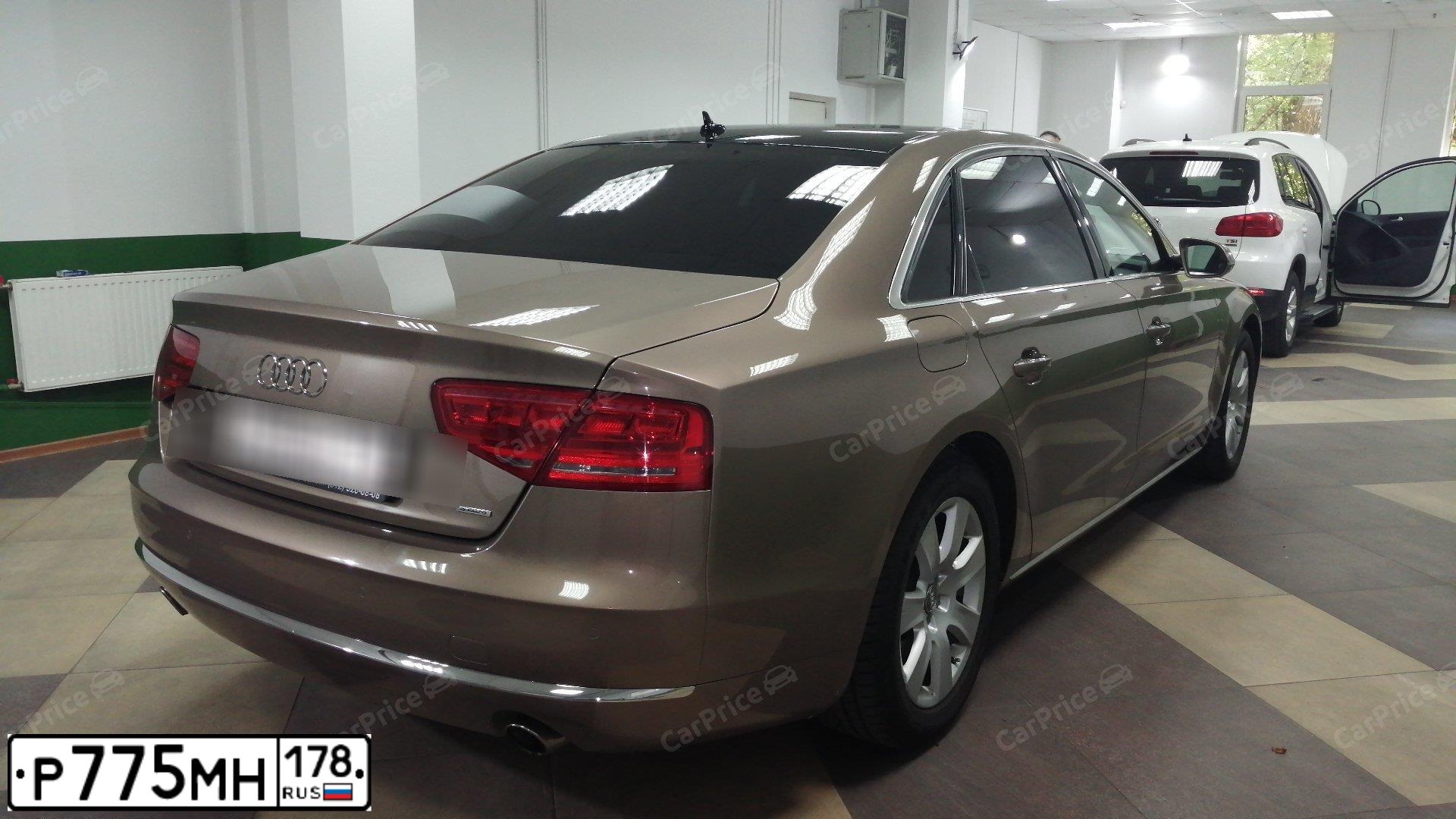 Фото автомобиля AUDI A8, 2011 — госномер А166АА98. Цвет: БЕЖЕВЫЙ