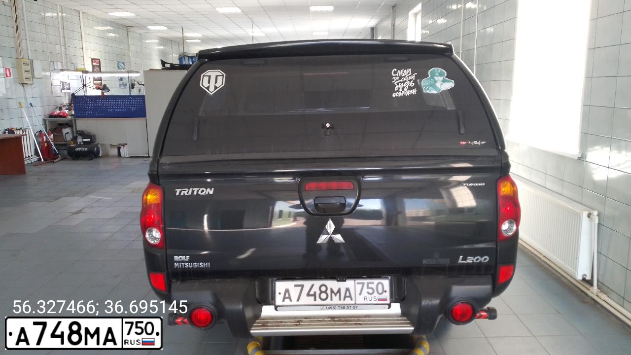 Фото автомобиля MITSUBISHI L 200, 2014 — госномер А748МА750. Цвет: ЧЕРНЫЙ
