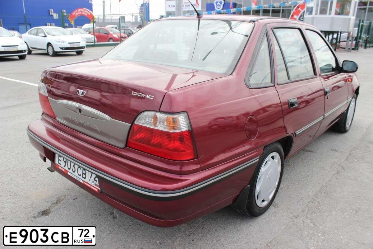 Фото автомобиля DAEWOO NEXIA, 2007 — госномер Е903СВ72. Цвет: ВИШНЕВЫЙ