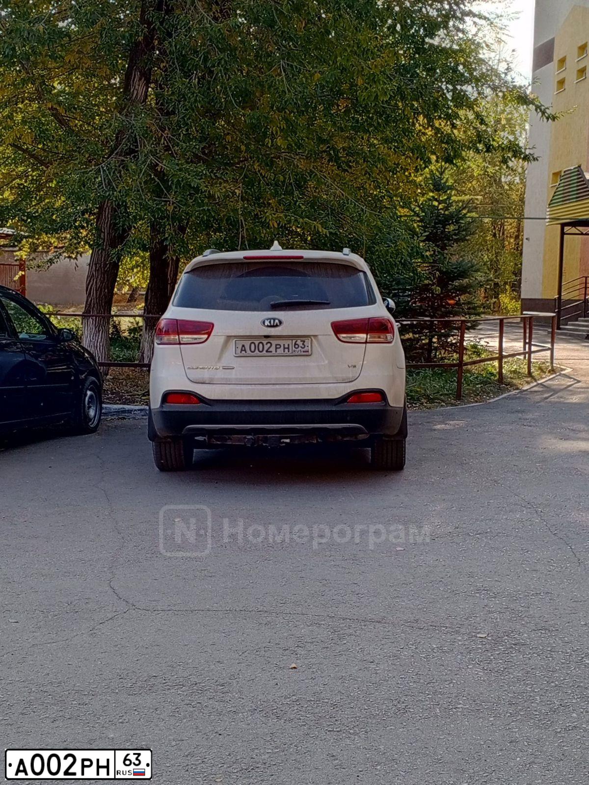Фото автомобиля CHEVROLET CAPTIVA, 2007 — госномер А002РН63. Цвет: ЧЕРНЫЙ