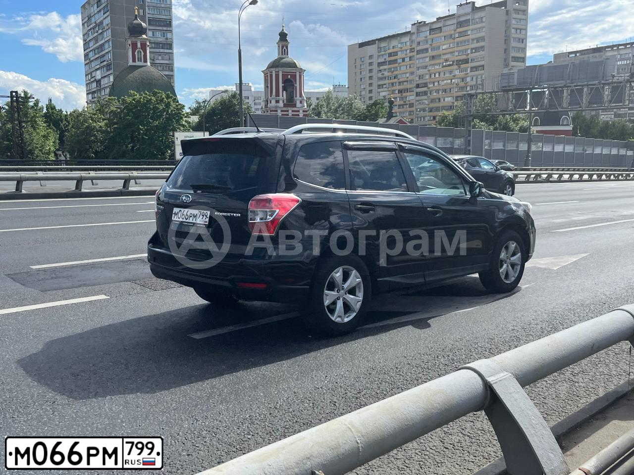 Фото автомобиля SUBARU FORESTER, 2013 — госномер М066РМ799. Цвет: ЧЕРНЫЙ