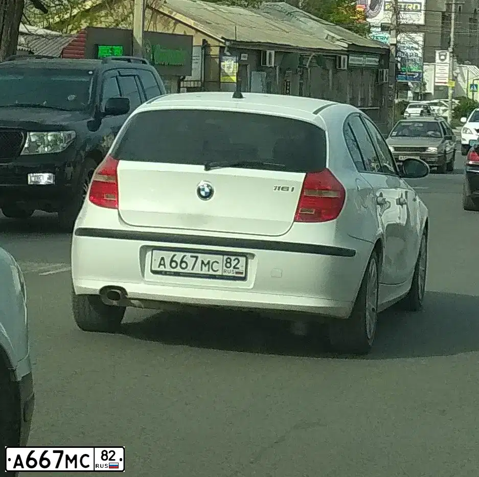 Фото автомобиля BMW 116I, 2009 — госномер Е800ММ761. Цвет: Белый