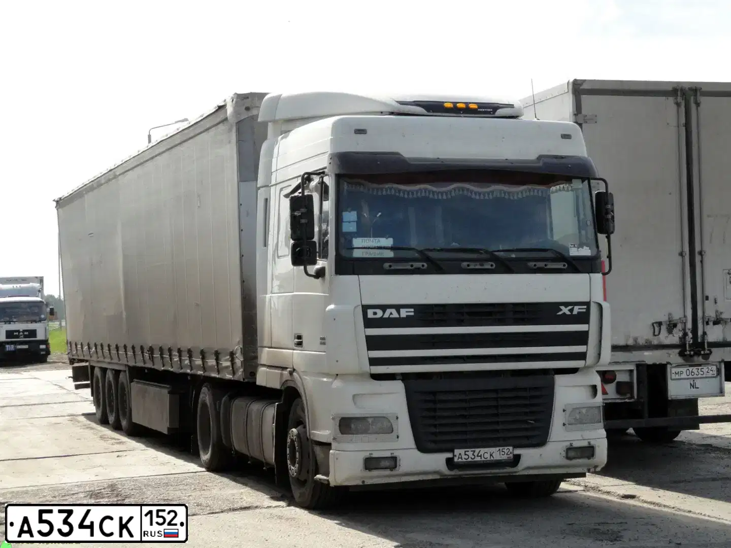 Фото автомобиля DAF XF 95 FT /4X2/, 2005 — госномер Е974УК13. Цвет: Белый