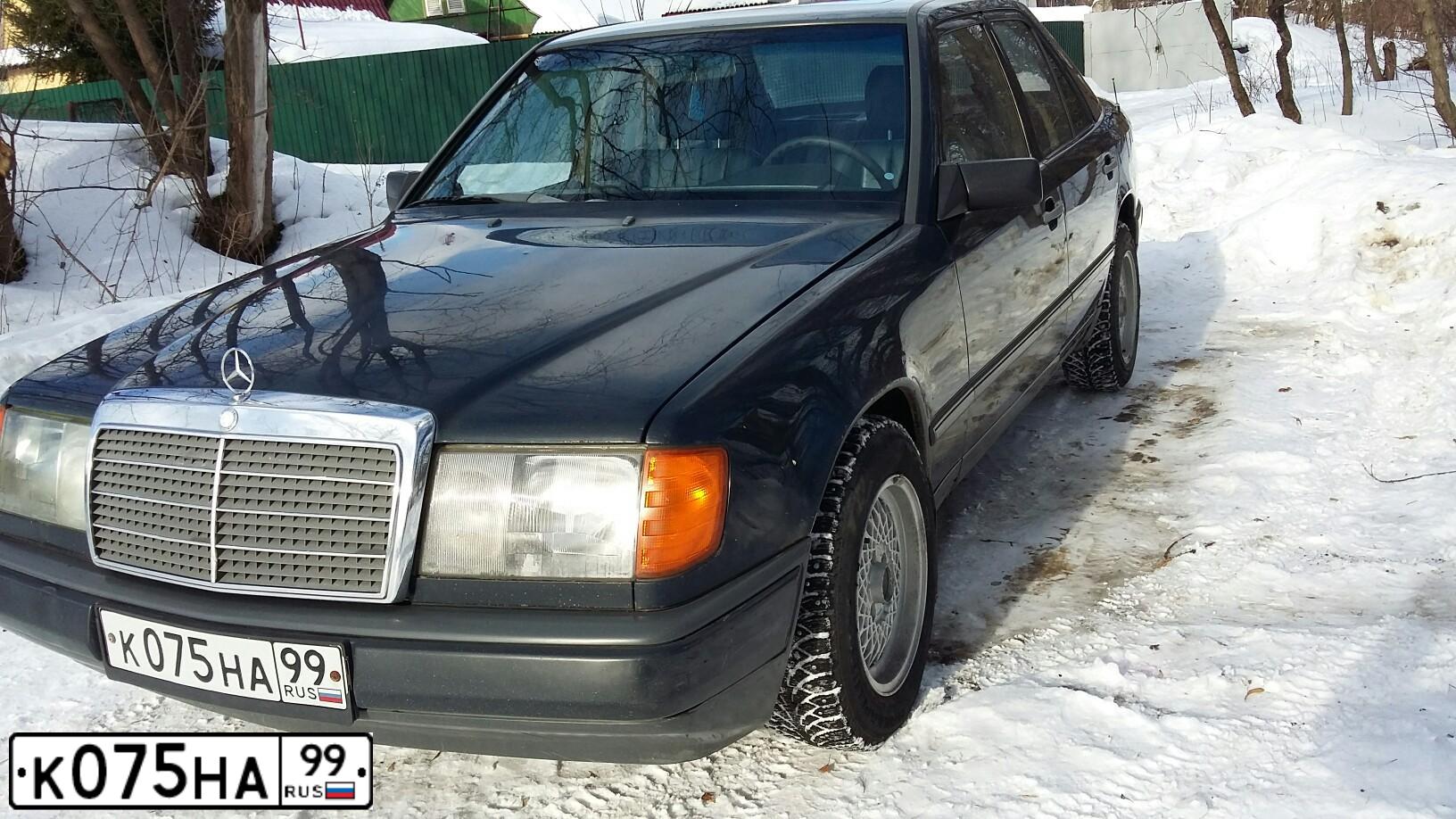 Фото автомобиля MERCEDES E-KLASSE, 1988 — госномер К075НА99. Цвет: СИНИЙ ТЕМНЫЙ