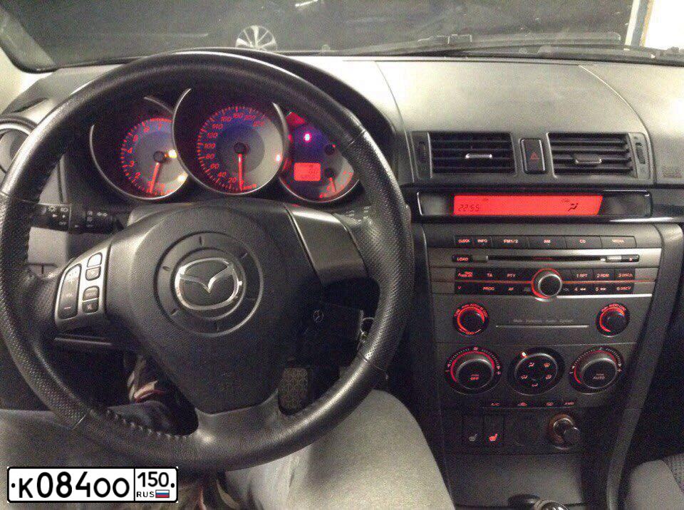Фото автомобиля MAZDA 3, 2007 — госномер К084ОО150. Цвет: ЧЕРНЫЙ