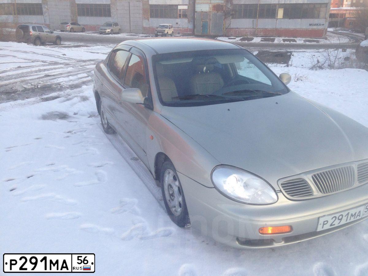 Фото автомобиля КАМАЗ  55102, 2001 — госномер Е671РР56. Цвет: ОРАНЖЕВЫЙ