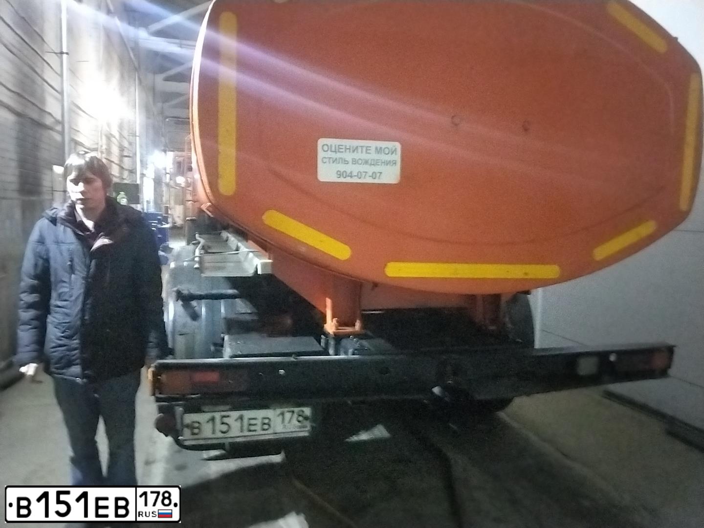 Фото автомобиля KAMAZ 65115 /6X4/, 2011 — госномер В151ЕВ178. Цвет: ОРАНЖЕВЫЙ