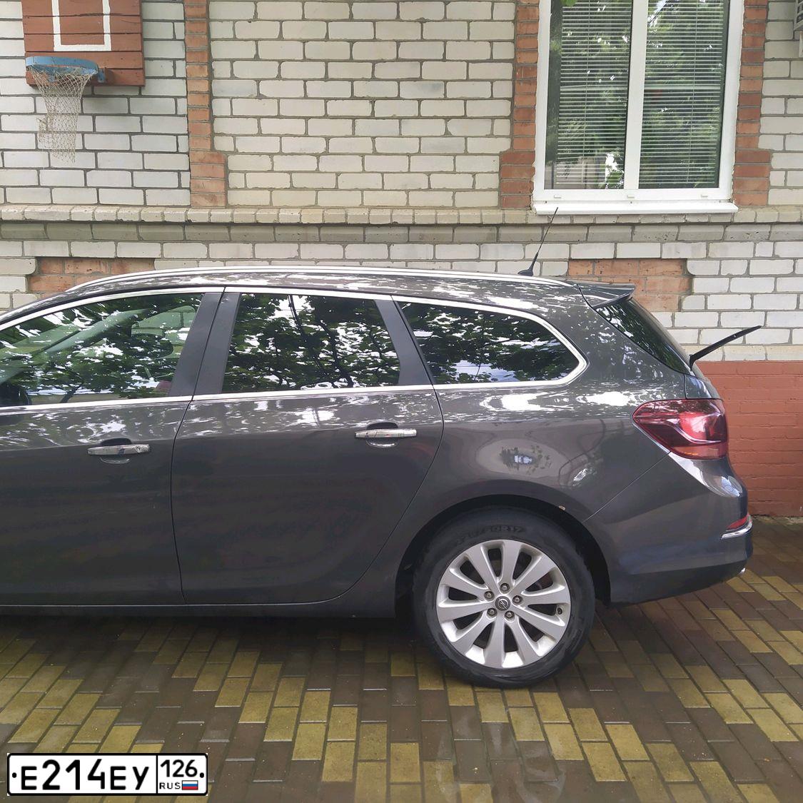 Фото автомобиля OPEL ASTRA, 2013 — госномер К617РЕ69. Цвет: СЕРЫЙ