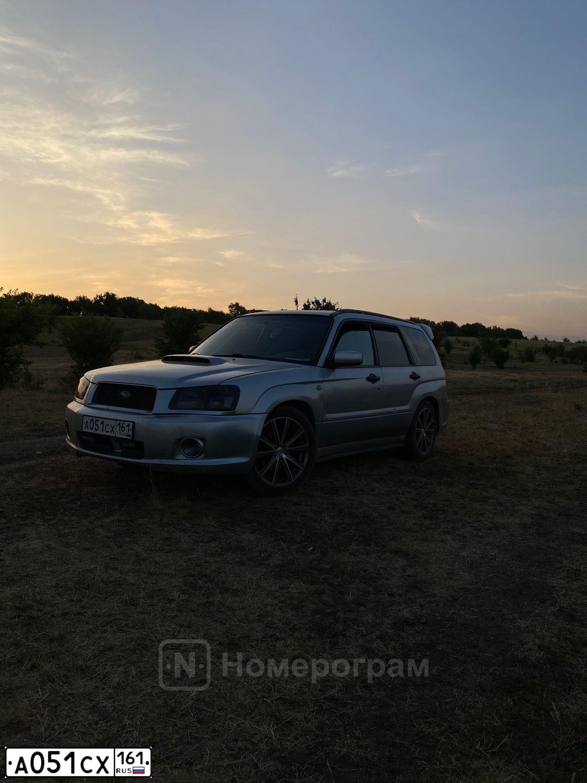 Фото автомобиля LADA 2112, 2008 — госномер В379ЕТ761. Цвет: Темно-зеленый