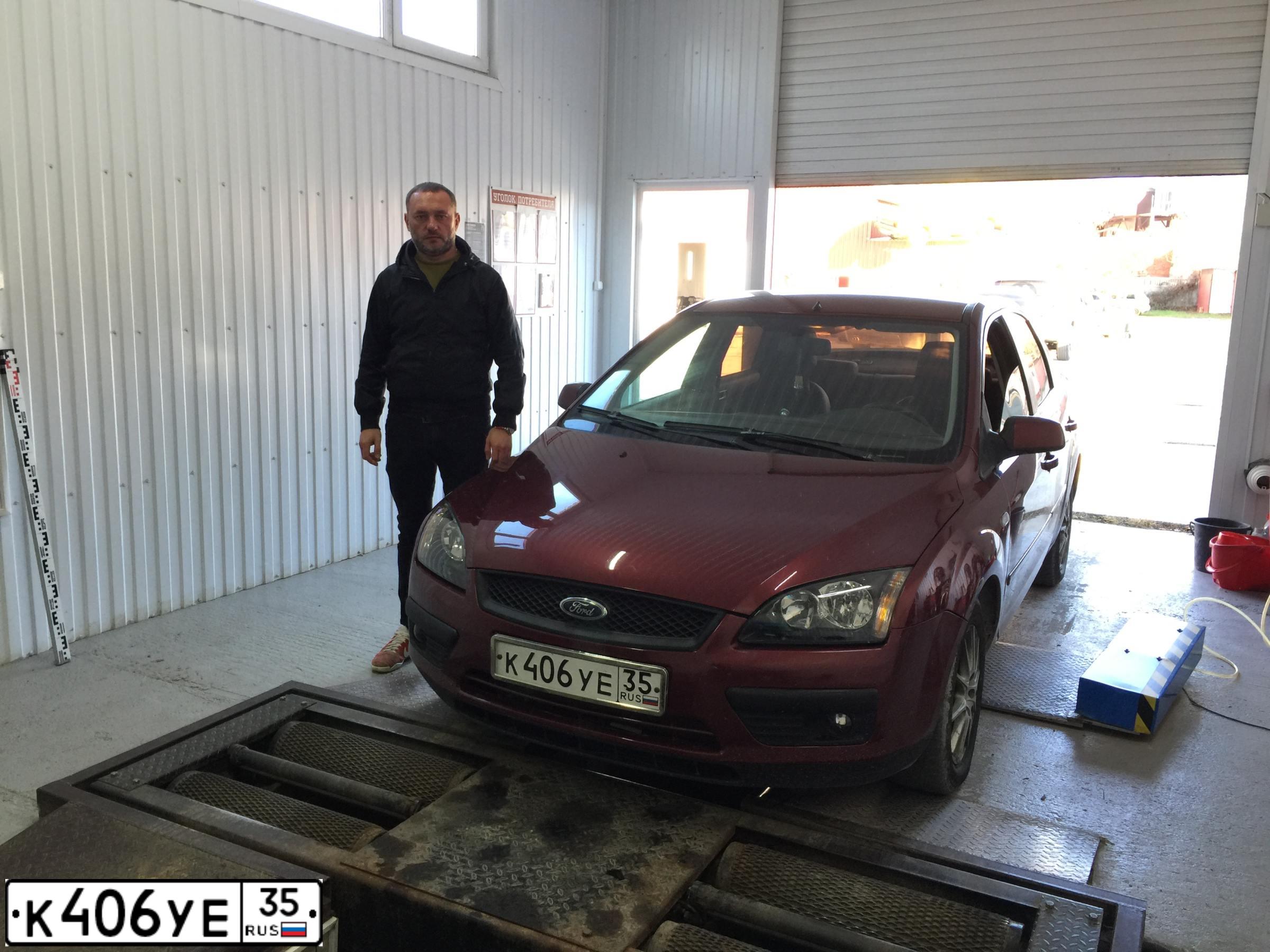Фото автомобиля FORD FOCUS, 2006 — госномер К406УЕ35. Цвет: ВИШНЕВЫЙ