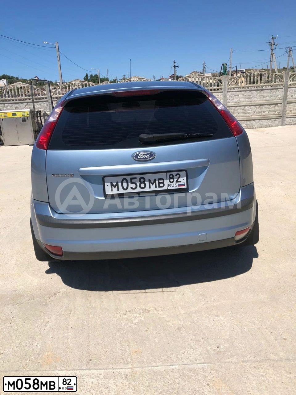 Фото автомобиля FORD FOCUS, 2006 — госномер М058МВ82. Цвет: СВЕТЛО-СЕРО-ГОЛУБОЙ