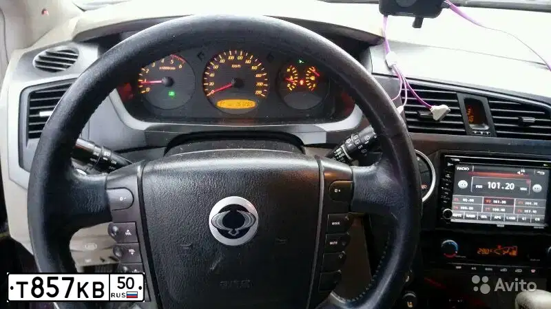Фото автомобиля SSANGYONG KYRON, 2008 — госномер О150УЕ150. Цвет: Красный
