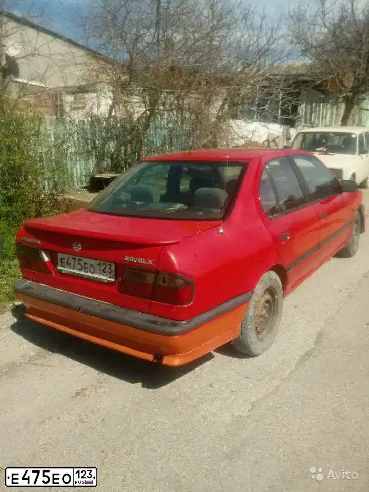 Фото автомобиля NISSAN PRIMERA, 1995 — госномер Е475ЕО123. Цвет: СВЕТЛО-КРАСНЫЙ