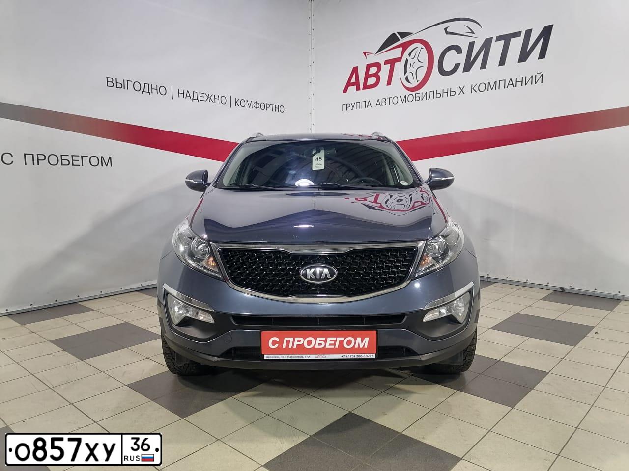 Фото автомобиля KIA SPORTAGE, 2014 — госномер Х983МУ136. Цвет: синий