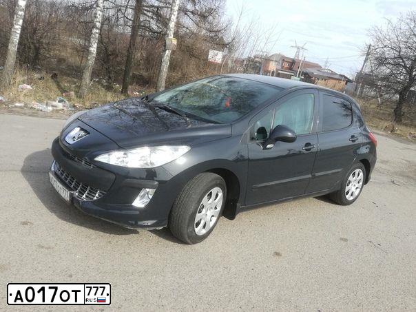Фото автомобиля PEUGEOT 308, 2010 — госномер Х415НР31. Цвет: СЕРЫЙ