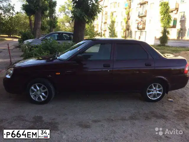 Фото автомобиля LADA 2170 PRIORA, 2008 — госномер Р664ЕМ34. Цвет: ТЕМНО ВИШНЕВЫЙ