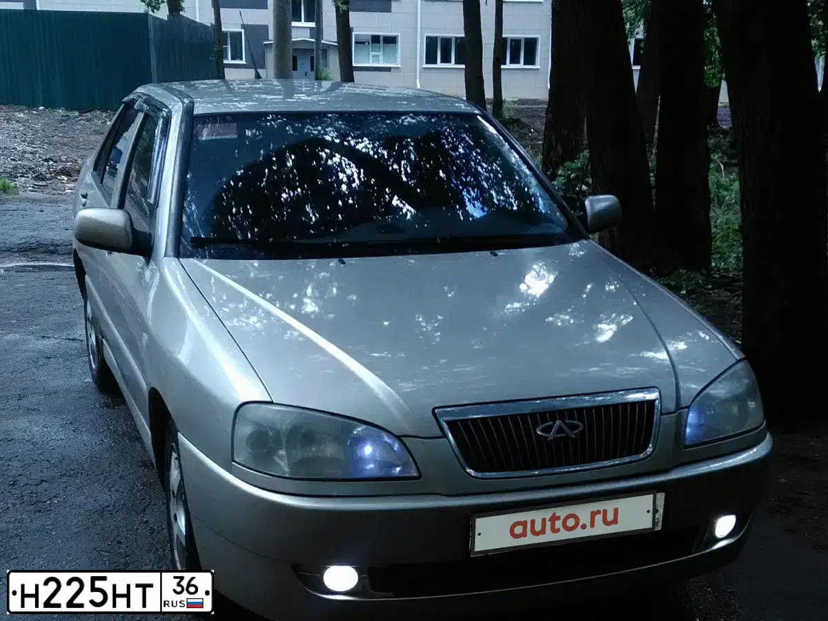 Фото автомобиля CHERY AMULET /FLAGCLOUD/, 2007 — госномер Н225НТ36. Цвет: СЕРЫЙ