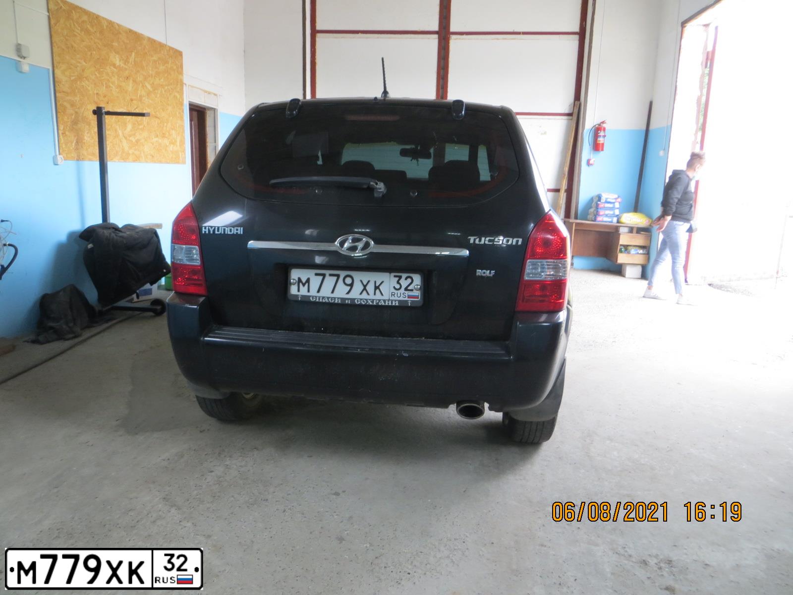 Фото автомобиля HYUNDAI TUCSON, 2008 — госномер М779ХК32. Цвет: ЧЕРНЫЙ