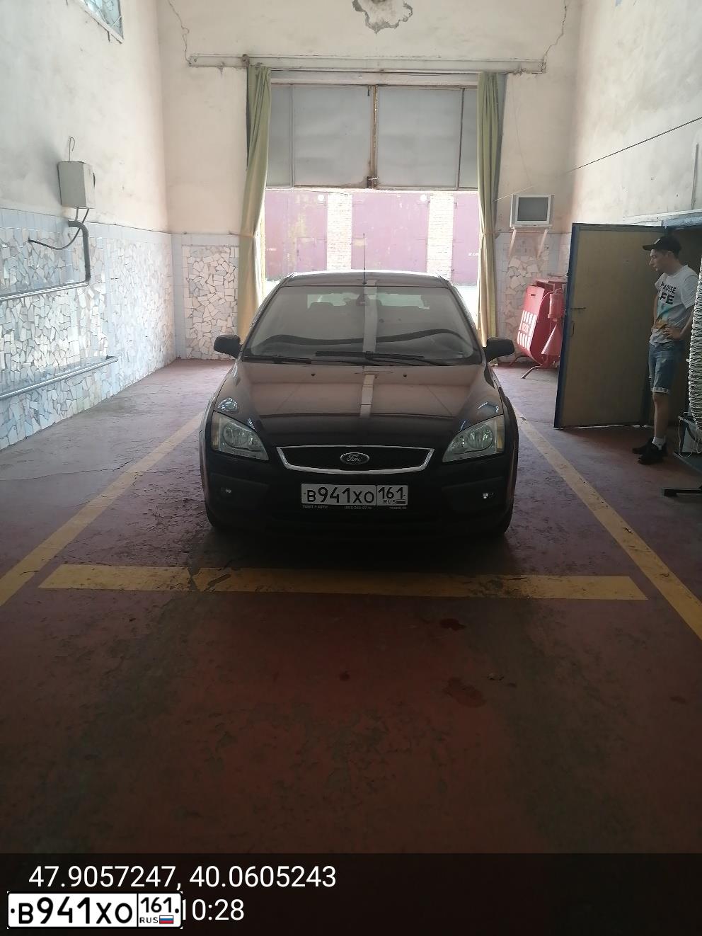 Фото автомобиля FORD FOCUS, 2006 — госномер Н570УУ161. Цвет: ЧЕРНЫЙ