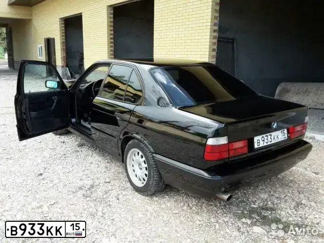 Фото автомобиля BMW W SERIE 5, 1991 — госномер Т471СР797. Цвет: ЧЕРНЫЙ
