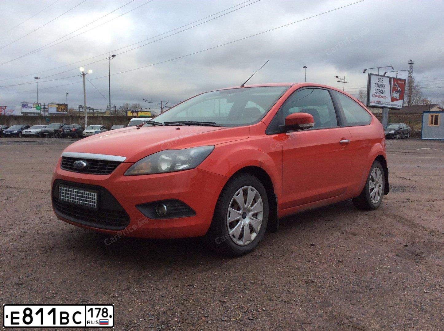 Фото автомобиля FORD FOCUS, 2010 — госномер Р022УУ40. Цвет: КРАСНЫЙ