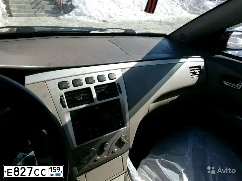 Фото автомобиля VORTEX ESTINA, 2010 — госномер Е220СУ702. Цвет: Красный